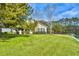 House exterior showcasing a beautiful lawn and water feature at 113 Knight Circle # 2, Pawleys Island, SC 29585