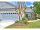 Attached garage with large door and brick accent wall at 113 Knight Circle # 2, Pawleys Island, SC 29585