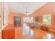 Spacious living room with hardwood floors and access to sunroom at 113 Knight Circle # 2, Pawleys Island, SC 29585