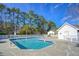 Community pool with a spacious deck area at 113 Knight Circle # 2, Pawleys Island, SC 29585