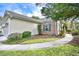 Brick and siding exterior with a curved walkway and landscaping at 113 Knight Circle # 2, Pawleys Island, SC 29585