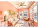 Bright sunroom with tiled floor, comfy seating, and access to backyard at 113 Knight Circle # 2, Pawleys Island, SC 29585