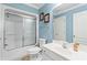Clean bathroom with a shower and white vanity at 118 Seabreeze Dr., Murrells Inlet, SC 29576