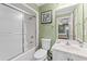 Clean bathroom with a shower/tub combo and white vanity at 118 Seabreeze Dr., Murrells Inlet, SC 29576