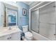 Clean bathroom with shower/tub combo and white vanity at 118 Seabreeze Dr., Murrells Inlet, SC 29576