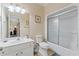 Clean bathroom with white vanity, toilet, and shower at 118 Seabreeze Dr., Murrells Inlet, SC 29576