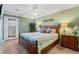 Bedroom with a king-size bed and private balcony access at 118 Seabreeze Dr., Murrells Inlet, SC 29576