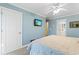 Serene bedroom with a light blue wall and a comfortable bed at 118 Seabreeze Dr., Murrells Inlet, SC 29576