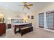 Spacious bedroom with ceiling fan and private access to balcony at 118 Seabreeze Dr., Murrells Inlet, SC 29576
