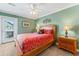 Bedroom with a queen bed and private balcony access at 118 Seabreeze Dr., Murrells Inlet, SC 29576