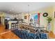 Bright dining room featuring a large table and hardwood floors at 118 Seabreeze Dr., Murrells Inlet, SC 29576