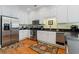 Modern kitchen with stainless steel appliances and granite countertops at 118 Seabreeze Dr., Murrells Inlet, SC 29576