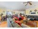 Open concept living and dining area with hardwood floors and comfortable seating at 118 Seabreeze Dr., Murrells Inlet, SC 29576