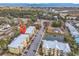 Aerial view showing building, pond, and nearby streets at 130 Puffin Dr. # 3-E, Pawleys Island, SC 29585