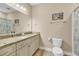 Bathroom with granite vanity, toilet, and shower/tub at 130 Puffin Dr. # 3-E, Pawleys Island, SC 29585