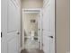 Clean bathroom with toilet and access to other rooms at 130 Puffin Dr. # 3-E, Pawleys Island, SC 29585