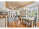 Spacious living room with hardwood floors and access to balcony at 130 Puffin Dr. # 3-E, Pawleys Island, SC 29585