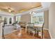 Spacious living room with hardwood floors and access to balcony at 130 Puffin Dr. # 3-E, Pawleys Island, SC 29585