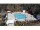 Community pool with plenty of lounge chairs and umbrellas at 1417 Lanterns Rest Rd., Myrtle Beach, SC 29579