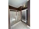 Bathroom featuring a glass enclosed shower at 1501 Brighton Ln., Longs, SC 29568