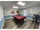 A well-lit billiard room in the recreation center has space for leisure and entertainment at 1501 Brighton Ln., Longs, SC 29568