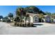 Charming single-story home featuring mature landscaping, a circular driveway, and a well-maintained exterior at 1501 Brighton Ln., Longs, SC 29568