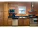Well-equipped kitchen features stainless steel appliances, sleek countertops, and ample cabinet space at 1501 Brighton Ln., Longs, SC 29568