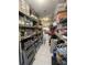 Well-stocked pantry with floor to ceiling shelving and plenty of storage space at 1501 Brighton Ln., Longs, SC 29568