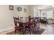 Bright dining area with a charming wooden table and six chairs at 1511 25Th Ave. N, North Myrtle Beach, SC 29582