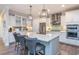 Modern kitchen with white cabinets, an island, and stainless steel appliances at 1757 Tryon Dr, Myrtle Beach, SC 29588