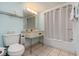 Clean bathroom with shower/tub combo and light blue walls at 205 74Th Ave. N # 1603, Myrtle Beach, SC 29572