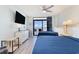 Bedroom with two beds, TV, and ocean view at 205 74Th Ave. N # 1603, Myrtle Beach, SC 29572