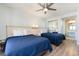 Bedroom with two beds, ceiling fan, and ocean view at 205 74Th Ave. N # 1603, Myrtle Beach, SC 29572