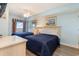 Guest bedroom with two twin beds, ocean view, and light blue walls at 205 74Th Ave. N # 1603, Myrtle Beach, SC 29572