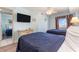 Bedroom with two twin beds, TV, and ocean view at 205 74Th Ave. N # 1603, Myrtle Beach, SC 29572