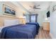 Bedroom with two beds, TV, and ocean view at 205 74Th Ave. N # 1603, Myrtle Beach, SC 29572