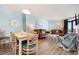 Dining area with light wood table and chairs at 205 74Th Ave. N # 1603, Myrtle Beach, SC 29572