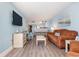 Spacious living area with light walls and wood floors at 205 74Th Ave. N # 1603, Myrtle Beach, SC 29572