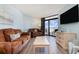 Living room with ocean view and comfortable seating at 205 74Th Ave. N # 1603, Myrtle Beach, SC 29572
