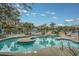 Resort-style pool with multiple areas for swimming and relaxing at 205 74Th Ave. N # 1603, Myrtle Beach, SC 29572