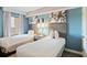 Bright bedroom featuring two cozy twin beds and stylish decor at 2106 N Ocean Bl N Ocean Blvd. # 211, Myrtle Beach, SC 29577