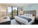 Bedroom with a balcony overlooking ocean views at 2106 N Ocean Bl N Ocean Blvd. # 211, Myrtle Beach, SC 29577