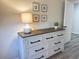 White dresser with dark top and black drawer pulls at 211 Baslow Ct. # 2-D, Myrtle Beach, SC 29572