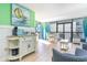 Condo living room with ocean view and white cabinet at 2311 South Ocean Blvd. # 371, Myrtle Beach, SC 29577