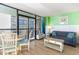 Condo living area with seating and dining for four at 2311 South Ocean Blvd. # 371, Myrtle Beach, SC 29577