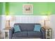 Cozy living room featuring a comfortable sofa and accent pillows at 2311 South Ocean Blvd. # 371, Myrtle Beach, SC 29577