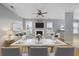 Dining area with marble table, grey chairs and view into living room at 237 Chesapeake Ln., Murrells Inlet, SC 29576