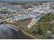 Aerial view of community near waterfront and bridge at 244 Gloucester Way, Little River, SC 29566