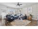 Relaxing living room with sectional sofa and cozy seating at 244 Gloucester Way, Little River, SC 29566
