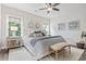 Spacious main bedroom with comfortable bed and large windows at 244 Gloucester Way, Little River, SC 29566